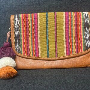 Nena & Co. Convertible Crossbody Belt Bag with two straps, tassel and cover bag
